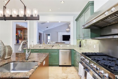 Exquisite mediterranean style pool home on .36-acre lot located on Palma Ceia Golf and Country Club in Florida - for sale on GolfHomes.com, golf home, golf lot