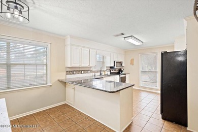 Absolutely beautiful 4 bedroom 2 bath -- foyer entry, formal on Castlewoods Golf Club in Mississippi - for sale on GolfHomes.com, golf home, golf lot