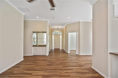 Nestled within the serene and gated Estero Country Club - The on Estero Country Club in Florida - for sale on GolfHomes.com, golf home, golf lot