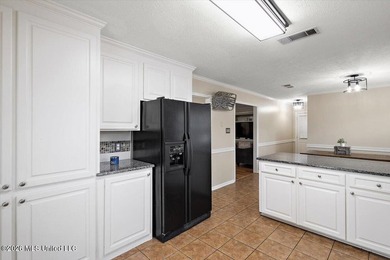 Absolutely beautiful 4 bedroom 2 bath -- foyer entry, formal on Castlewoods Golf Club in Mississippi - for sale on GolfHomes.com, golf home, golf lot