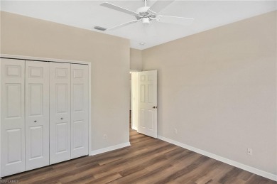 Nestled within the serene and gated Estero Country Club - The on Estero Country Club in Florida - for sale on GolfHomes.com, golf home, golf lot