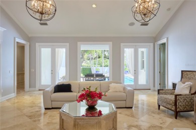 Exquisite mediterranean style pool home on .36-acre lot located on Palma Ceia Golf and Country Club in Florida - for sale on GolfHomes.com, golf home, golf lot