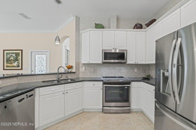 Elegant 4BR/3BA Gated with Guarded on .97 acre! A Beautifully on Country Club of Orange Park in Florida - for sale on GolfHomes.com, golf home, golf lot