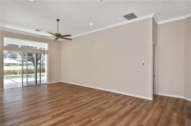 Nestled within the serene and gated Estero Country Club - The on Estero Country Club in Florida - for sale on GolfHomes.com, golf home, golf lot