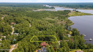 Build your dream home on this half-acre lot in Gated, Marina on Harbour Point Golf Club in North Carolina - for sale on GolfHomes.com, golf home, golf lot