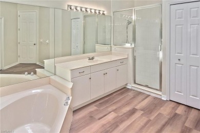 Nestled within the serene and gated Estero Country Club - The on Estero Country Club in Florida - for sale on GolfHomes.com, golf home, golf lot