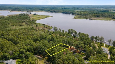 Build your dream home on this half-acre lot in Gated, Marina on Harbour Point Golf Club in North Carolina - for sale on GolfHomes.com, golf home, golf lot