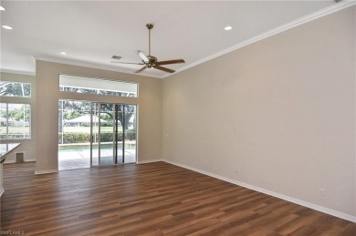 Nestled within the serene and gated Estero Country Club - The on Estero Country Club in Florida - for sale on GolfHomes.com, golf home, golf lot
