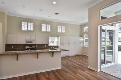 Nestled within the serene and gated Estero Country Club - The on Estero Country Club in Florida - for sale on GolfHomes.com, golf home, golf lot