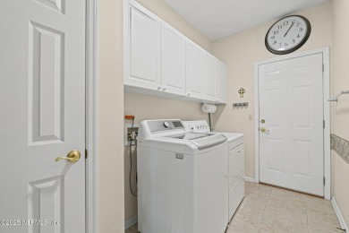 Elegant 4BR/3BA Gated with Guarded on .97 acre! A Beautifully on Country Club of Orange Park in Florida - for sale on GolfHomes.com, golf home, golf lot