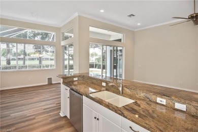 Nestled within the serene and gated Estero Country Club - The on Estero Country Club in Florida - for sale on GolfHomes.com, golf home, golf lot