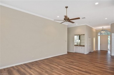 Nestled within the serene and gated Estero Country Club - The on Estero Country Club in Florida - for sale on GolfHomes.com, golf home, golf lot
