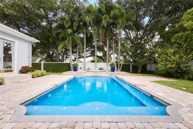 Exquisite mediterranean style pool home on .36-acre lot located on Palma Ceia Golf and Country Club in Florida - for sale on GolfHomes.com, golf home, golf lot