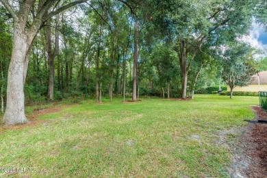 Elegant 4BR/3BA Gated with Guarded on .97 acre! A Beautifully on Country Club of Orange Park in Florida - for sale on GolfHomes.com, golf home, golf lot