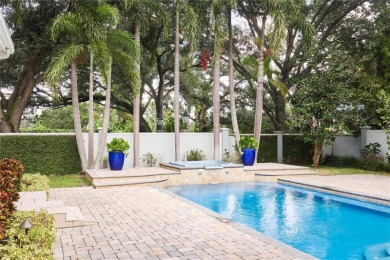 Exquisite mediterranean style pool home on .36-acre lot located on Palma Ceia Golf and Country Club in Florida - for sale on GolfHomes.com, golf home, golf lot
