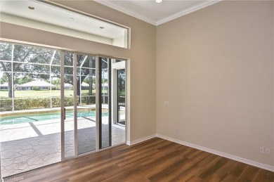 Nestled within the serene and gated Estero Country Club - The on Estero Country Club in Florida - for sale on GolfHomes.com, golf home, golf lot