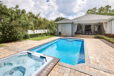 Exquisite mediterranean style pool home on .36-acre lot located on Palma Ceia Golf and Country Club in Florida - for sale on GolfHomes.com, golf home, golf lot