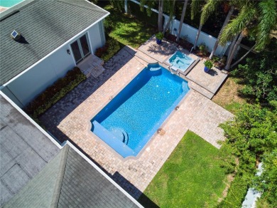 Exquisite mediterranean style pool home on .36-acre lot located on Palma Ceia Golf and Country Club in Florida - for sale on GolfHomes.com, golf home, golf lot