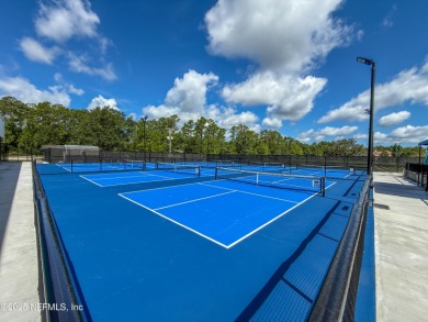 Elegant 4BR/3BA Gated with Guarded on .97 acre! A Beautifully on Country Club of Orange Park in Florida - for sale on GolfHomes.com, golf home, golf lot
