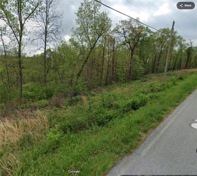 Good buildable lot in a location of nice new construction and on Bella Vista Country Club - Highlands in Arkansas - for sale on GolfHomes.com, golf home, golf lot
