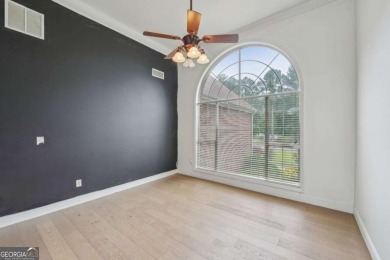 Welcome home to this beautiful all-brick ranch in the on Canongate At Georgia National Golf Club in Georgia - for sale on GolfHomes.com, golf home, golf lot