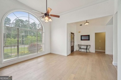 Welcome home to this beautiful all-brick ranch in the on Canongate At Georgia National Golf Club in Georgia - for sale on GolfHomes.com, golf home, golf lot