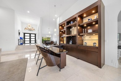 Sunny & warm tropical paradise! This beautifully updated & on Bocaire Country Club in Florida - for sale on GolfHomes.com, golf home, golf lot