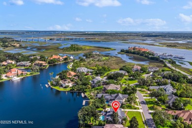 A magnificent WATERFRONT HOME in one of Florida's most coveted on Queens Harbour Yacht and Country Club in Florida - for sale on GolfHomes.com, golf home, golf lot