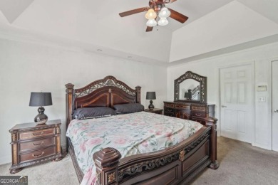 Welcome home to this beautiful all-brick ranch in the on Canongate At Georgia National Golf Club in Georgia - for sale on GolfHomes.com, golf home, golf lot
