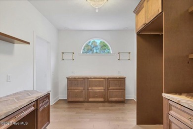 Custom estate home in Pinewild Country Club, perfectly situated on Pinewild Country Club of Pinehurst in North Carolina - for sale on GolfHomes.com, golf home, golf lot