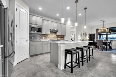 This 2021 TURNKEY Pulte *Summerwood* with a COURSE APPROVED golf on River Hall Country Club in Florida - for sale on GolfHomes.com, golf home, golf lot