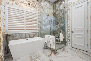 Experience timeless elegance and modern luxury in this fully on Old Palm Golf Club in Florida - for sale on GolfHomes.com, golf home, golf lot