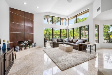 Sunny & warm tropical paradise! This beautifully updated & on Bocaire Country Club in Florida - for sale on GolfHomes.com, golf home, golf lot