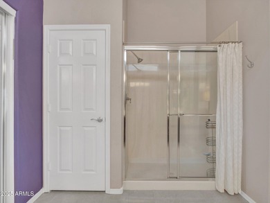 Beautifully maintained expanded Palmera model on the 14th green on Eagles Nest at Pebble Creek in Arizona - for sale on GolfHomes.com, golf home, golf lot