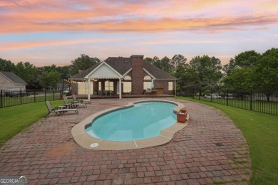 Welcome home to this beautiful all-brick ranch in the on Canongate At Georgia National Golf Club in Georgia - for sale on GolfHomes.com, golf home, golf lot