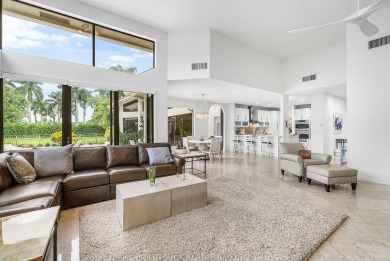 Sunny & warm tropical paradise! This beautifully updated & on Bocaire Country Club in Florida - for sale on GolfHomes.com, golf home, golf lot