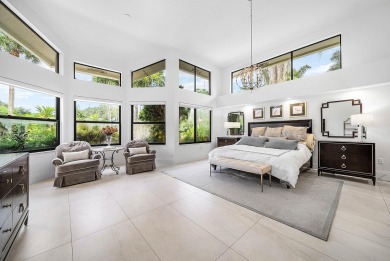 Sunny & warm tropical paradise! This beautifully updated & on Bocaire Country Club in Florida - for sale on GolfHomes.com, golf home, golf lot