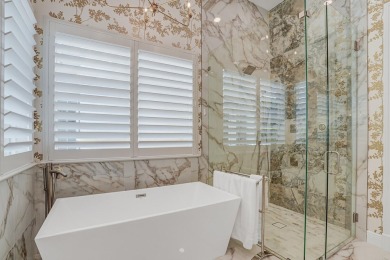 Experience timeless elegance and modern luxury in this fully on Old Palm Golf Club in Florida - for sale on GolfHomes.com, golf home, golf lot