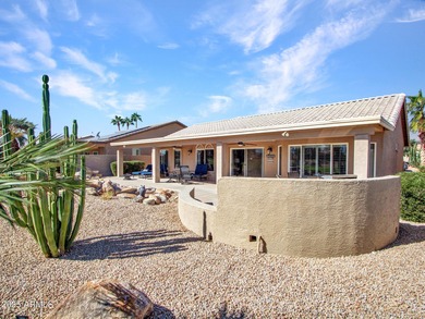 Beautifully maintained expanded Palmera model on the 14th green on Eagles Nest at Pebble Creek in Arizona - for sale on GolfHomes.com, golf home, golf lot