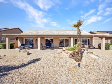 Beautifully maintained expanded Palmera model on the 14th green on Eagles Nest at Pebble Creek in Arizona - for sale on GolfHomes.com, golf home, golf lot