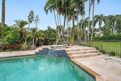 Sunny & warm tropical paradise! This beautifully updated & on Bocaire Country Club in Florida - for sale on GolfHomes.com, golf home, golf lot