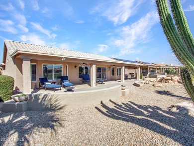 Beautifully maintained expanded Palmera model on the 14th green on Eagles Nest at Pebble Creek in Arizona - for sale on GolfHomes.com, golf home, golf lot