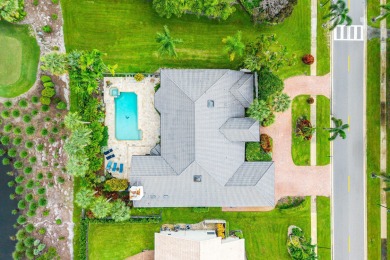 Sunny & warm tropical paradise! This beautifully updated & on Bocaire Country Club in Florida - for sale on GolfHomes.com, golf home, golf lot