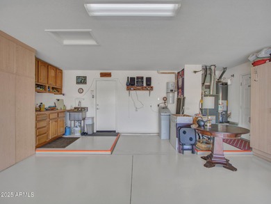 Beautifully maintained expanded Palmera model on the 14th green on Eagles Nest at Pebble Creek in Arizona - for sale on GolfHomes.com, golf home, golf lot