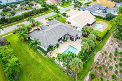 Sunny & warm tropical paradise! This beautifully updated & on Bocaire Country Club in Florida - for sale on GolfHomes.com, golf home, golf lot