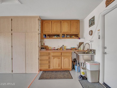 Beautifully maintained expanded Palmera model on the 14th green on Eagles Nest at Pebble Creek in Arizona - for sale on GolfHomes.com, golf home, golf lot