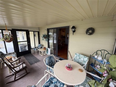 Welcome to this beautifully decorated home on the 7th Hole! on Orange Blossom Hills Golf and Country Club in Florida - for sale on GolfHomes.com, golf home, golf lot