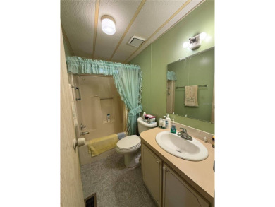 Welcome to this beautifully decorated home on the 7th Hole! on Orange Blossom Hills Golf and Country Club in Florida - for sale on GolfHomes.com, golf home, golf lot