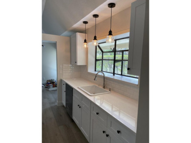 Beautifully renovated villa in the heart of Jupiter!  One level on The Golf Club of Jupiter in Florida - for sale on GolfHomes.com, golf home, golf lot