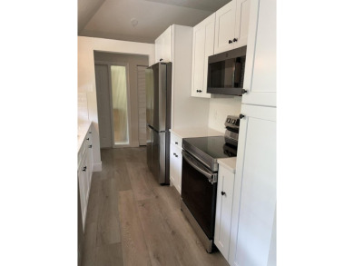 Beautifully renovated villa in the heart of Jupiter!  One level on The Golf Club of Jupiter in Florida - for sale on GolfHomes.com, golf home, golf lot